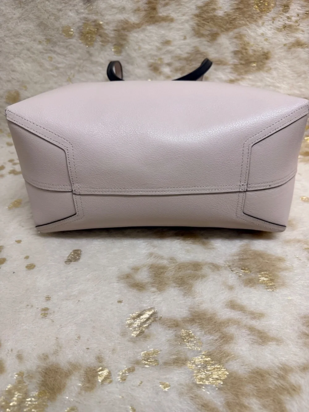 Stylish Kate Spade reversible tote in classic black with blush pink interior